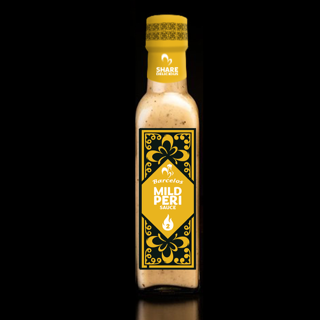 Bottle of Barcelos Peri Peri Sauce - Mild Peri, The Journeyman, featuring a blend of mellow bird’s eye chili and zesty lemon for a lite peri peri flavor.